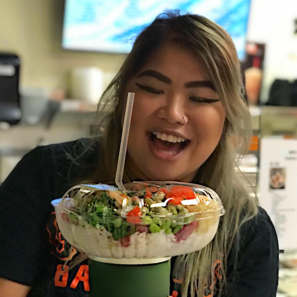 Smiling girl with GoLidZ cup